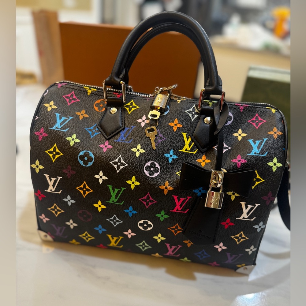 LV speedy 30 
New 
REAL LEATHER